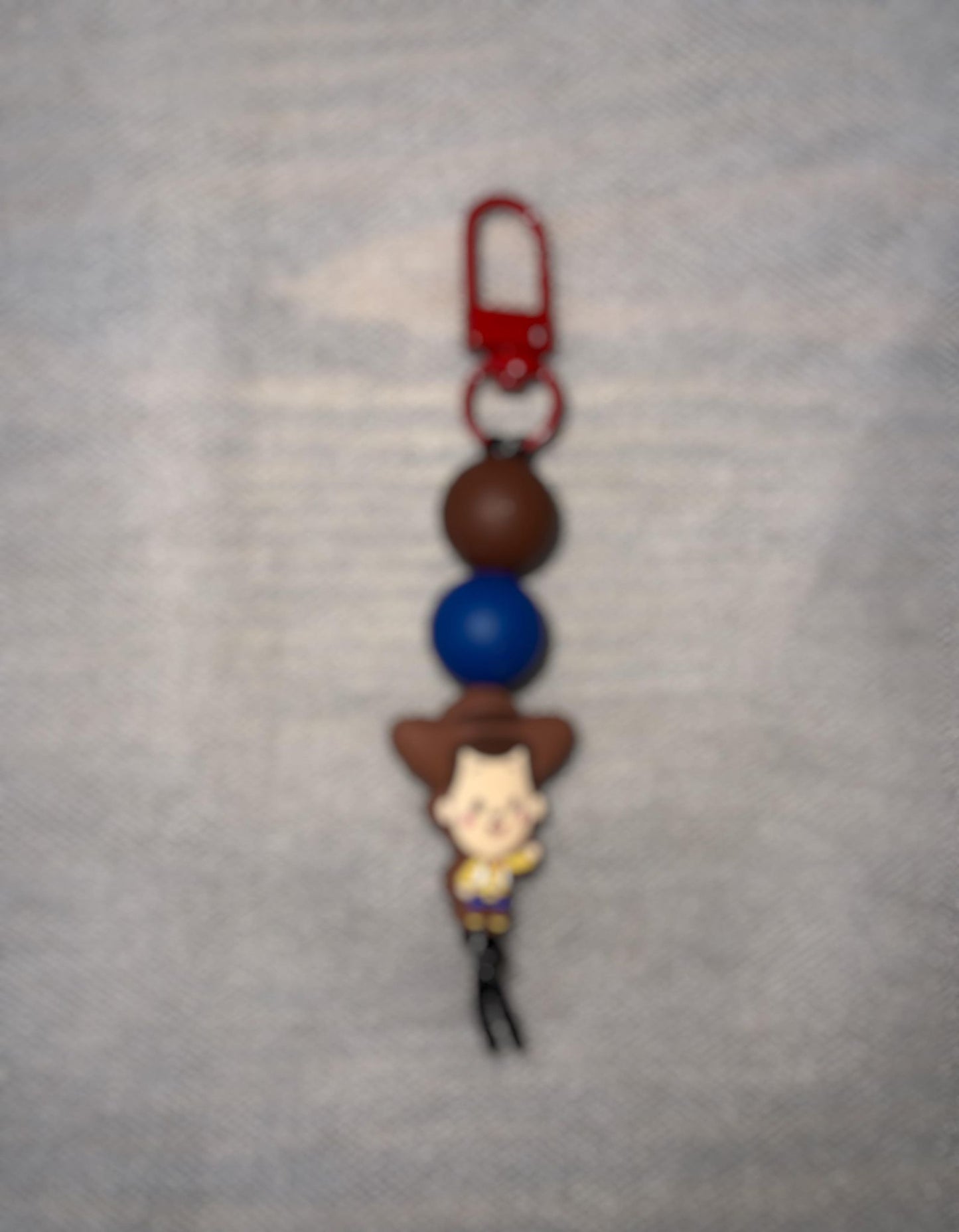 Toy Cowboy Zipper Pull