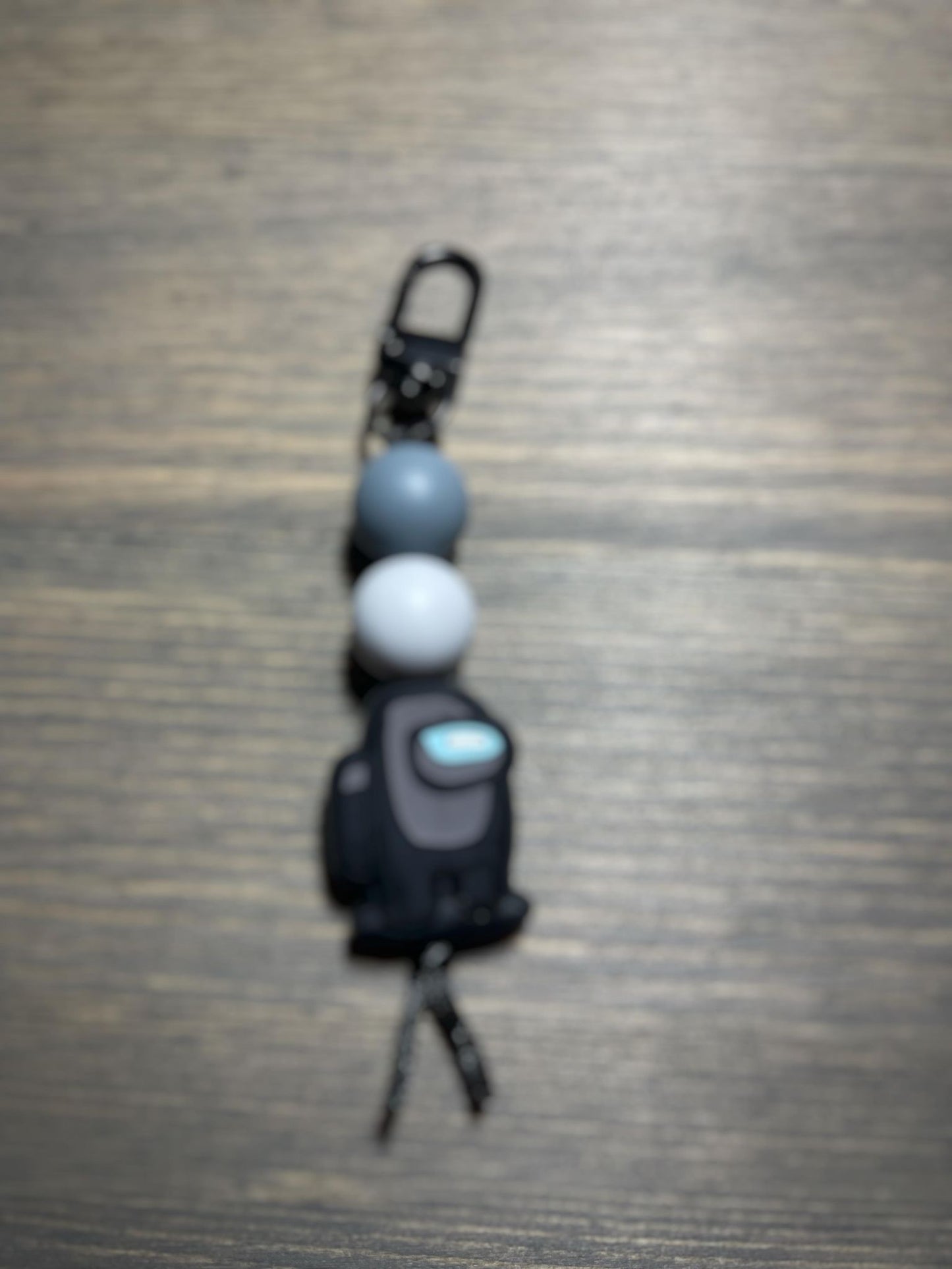 Suspicious Astronauts Zipper Pull