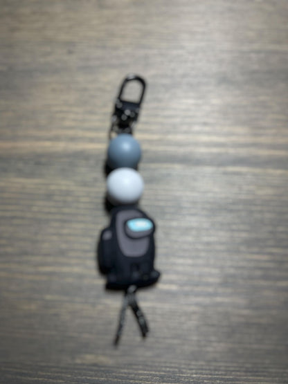 Suspicious Astronauts Zipper Pull