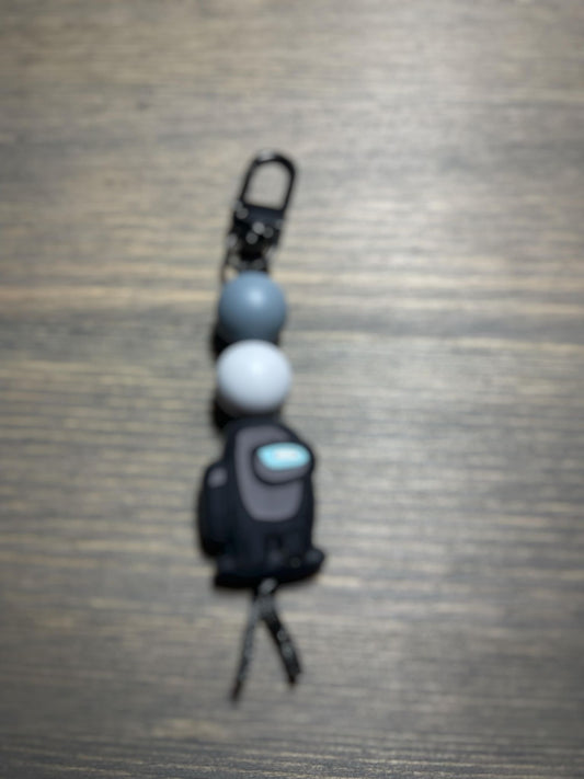 Suspicious Astronauts Zipper Pull