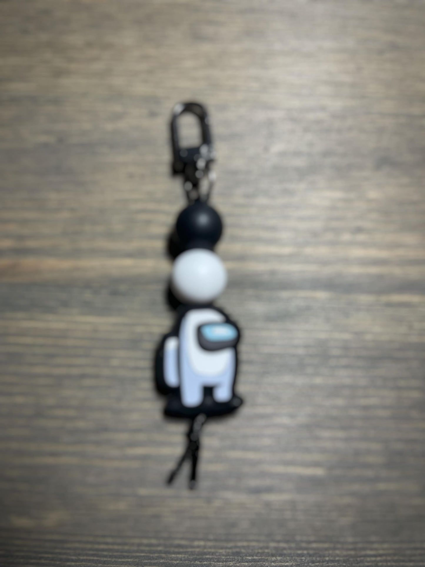 Suspicious Astronauts Zipper Pull